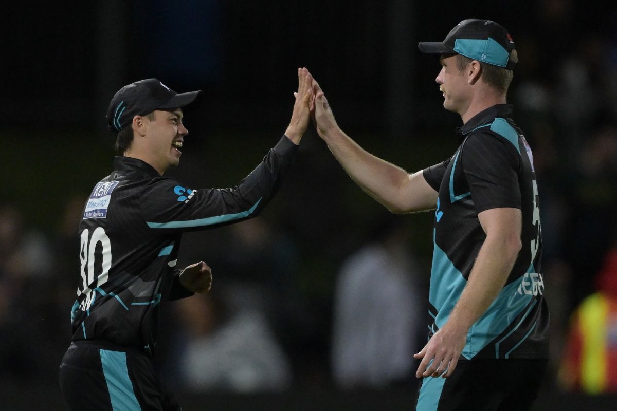 Mark Chapman and James Neesham celebrate after dismissing Ishan Kishan ...