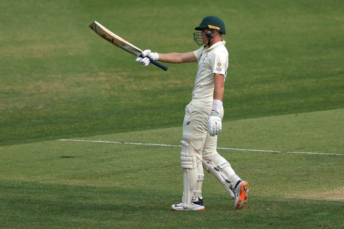 Marnus Labuschagne raises his bat upon reaching 150 | ESPNcricinfo.com