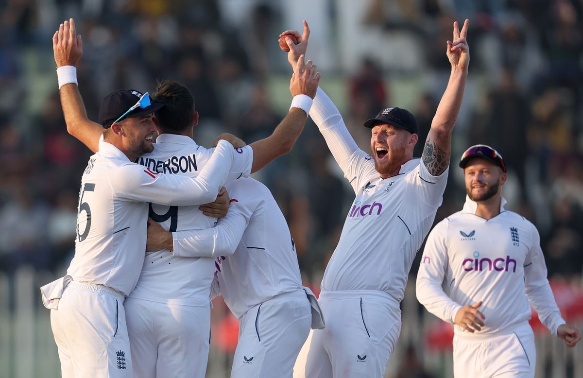 James Anderson is mobbed after taking two in three balls, Pakistan vs England, 1st Test, Rawalpindi, 5th day, December 5, 2022
