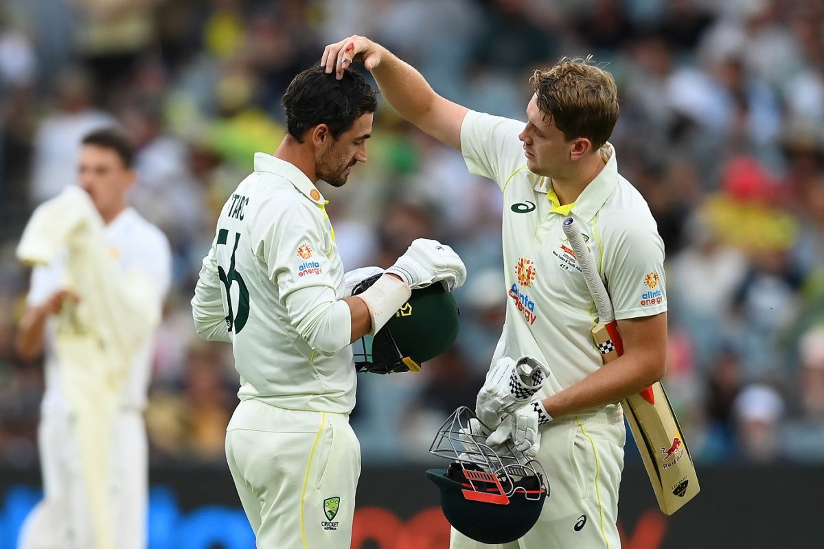 Cameron Green checks upon Mitchell Starc after he was struck on the helmet by a Marco Jansen bouncer, Australia vs South Africa, 2nd Test, Melbourne, 3rd day, December 28, 2022