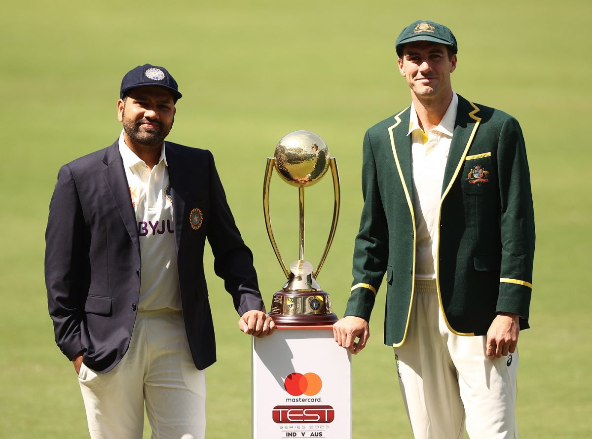 Captains Rohit Sharma and Pat Cummins pose with the BorderGavaskar