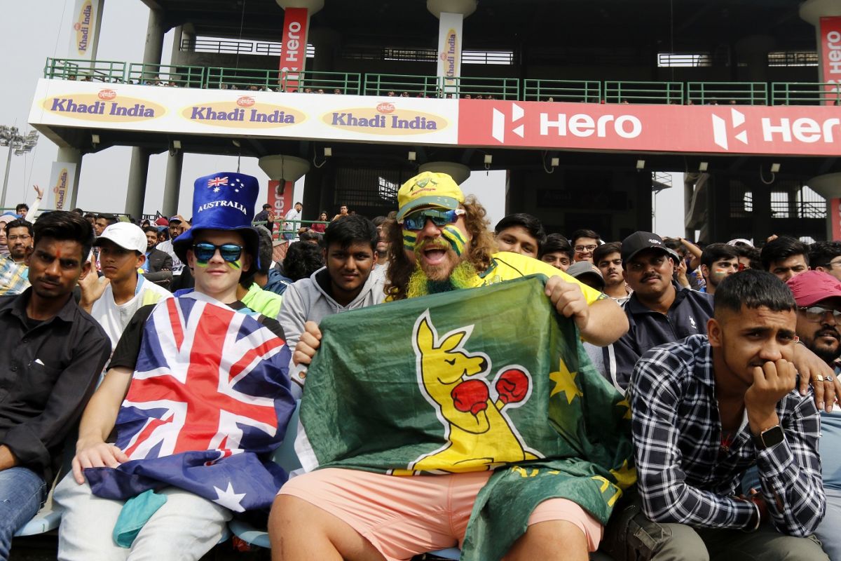The Australian fans cheer for their team