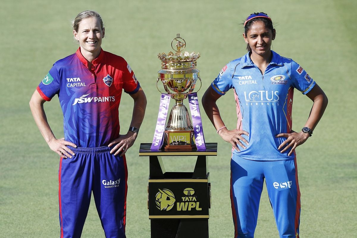 Harmanpreet Kaur and Meg Lanning pose with the WPL trophy ahead of the