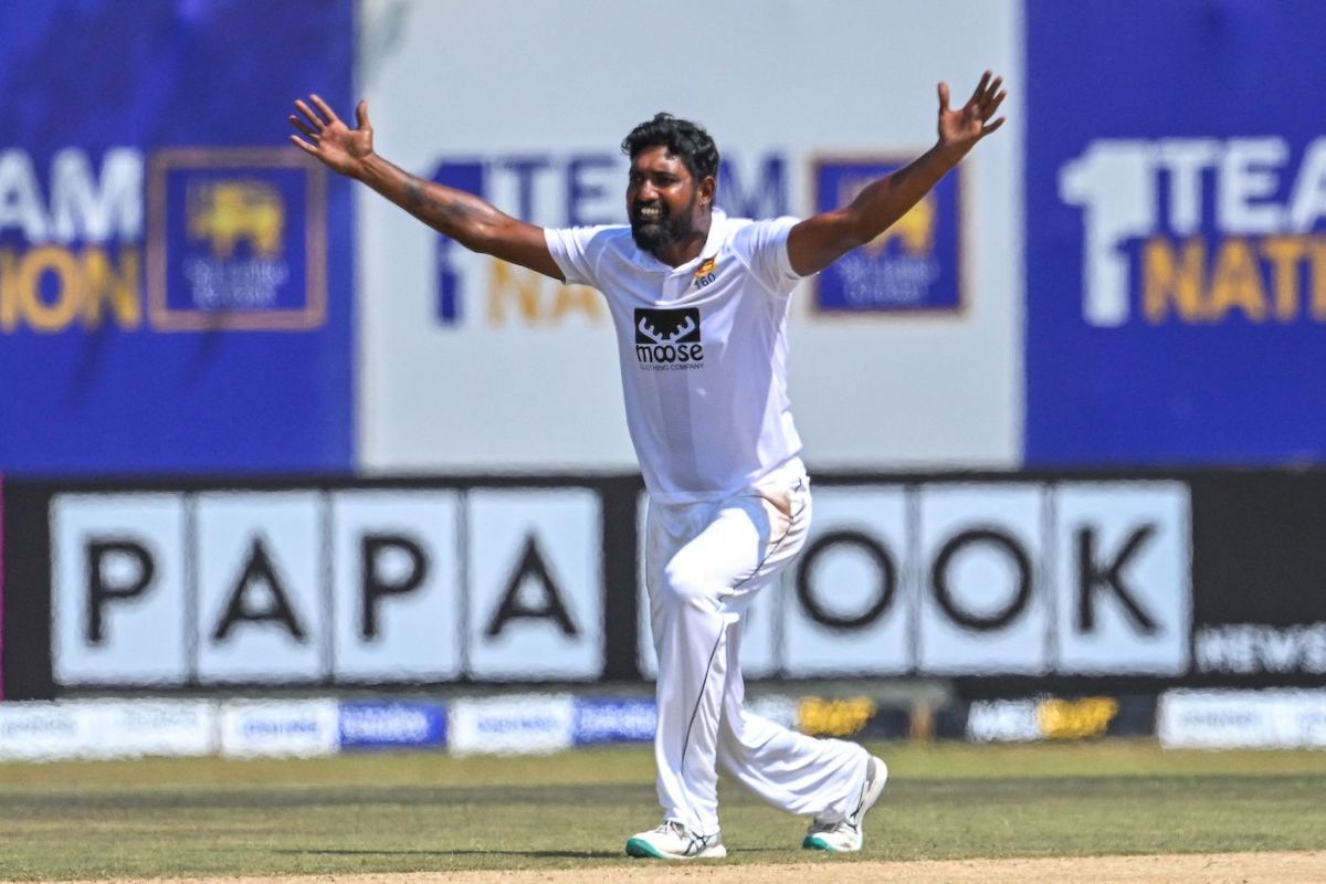 Prabath Jayasuriya poses with the ball with which he took a five-for ...