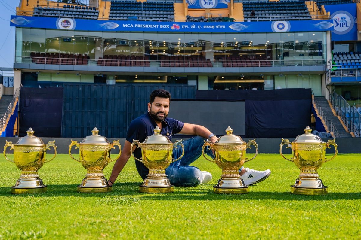 Rohit Sharma poses with the five IPL trophies he has won as Mumbai