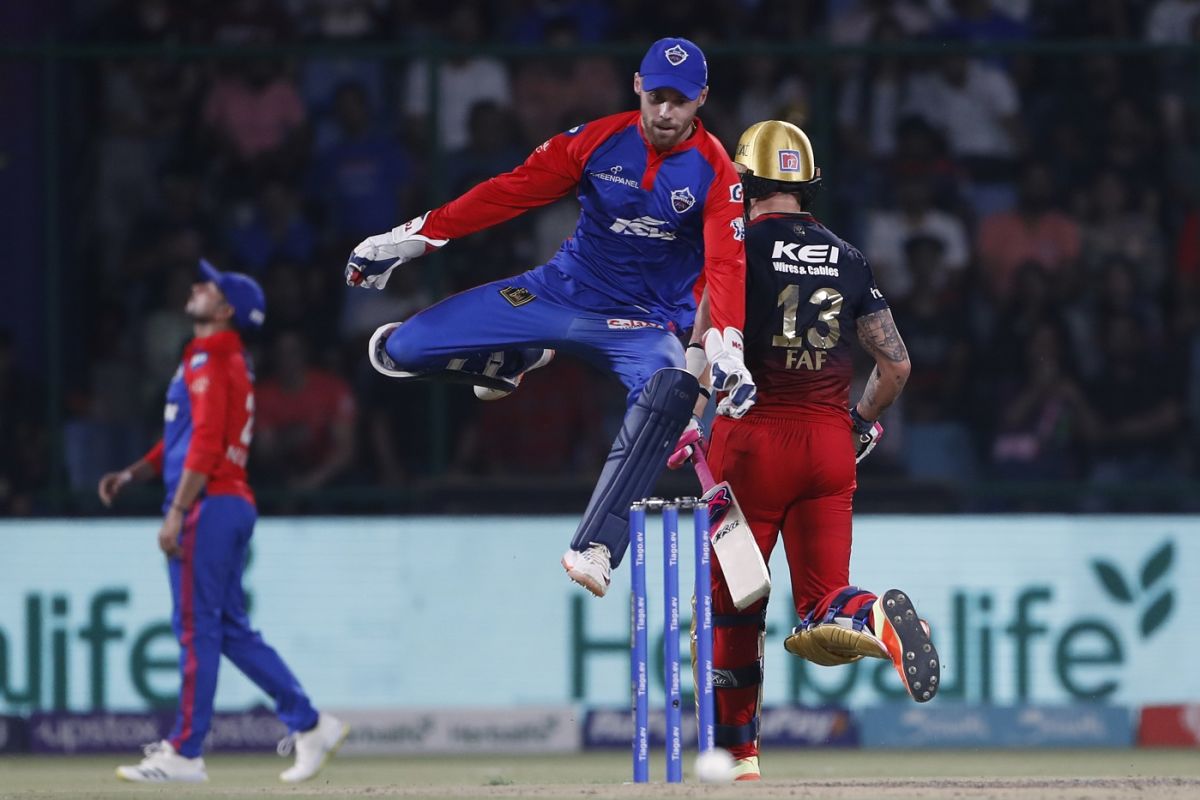 An airborne Phil Salt collects the ball as Faf du Plessis completes a ...