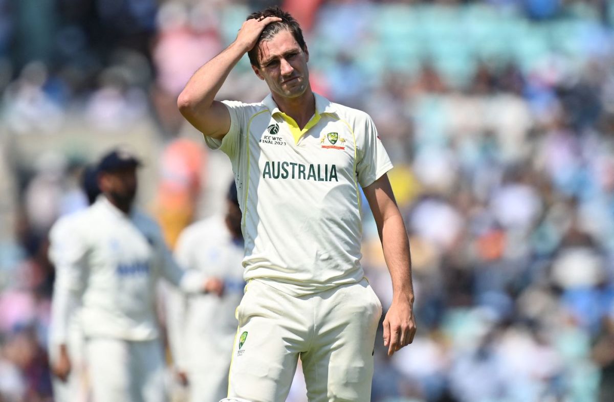Pat Cummins ruffles his hair | ESPNcricinfo.com