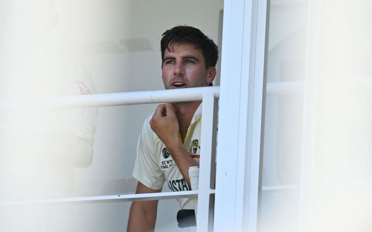 Pat Cummins ruffles his hair | ESPNcricinfo.com