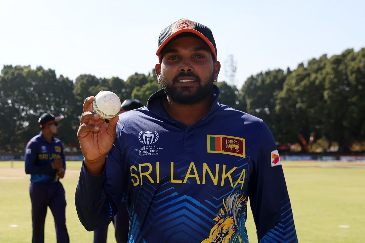 Wanindu Hasaranga holds the ball up after bagging five wickets against Oman, Oman vs Sri Lanka, ICC Cricket World Cup Qualifier, Bulawayo, June 23, 2023