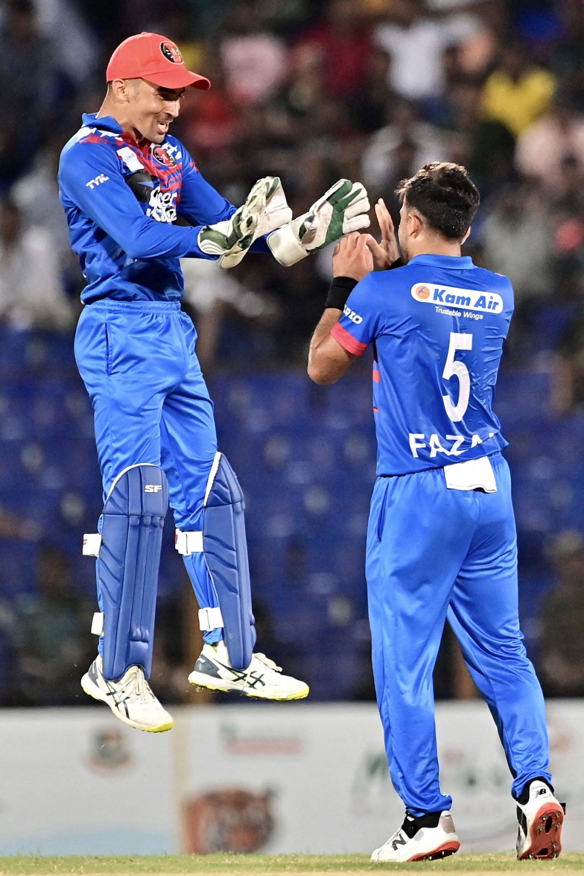 Fazalhaq Farooqi celebrates Litton Das' wicket with Rahmanullah Gurbaz, Bangladesh vs Afghanistan, 2nd ODI, Chattogram, July 8, 2023