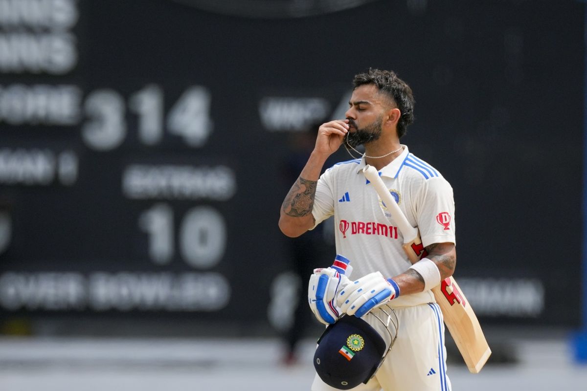 Virat Kohli Kisses His Wedding Ring ESPNcricinfo virat-kohli-kisses-his-wedding-ring-espncricinfo