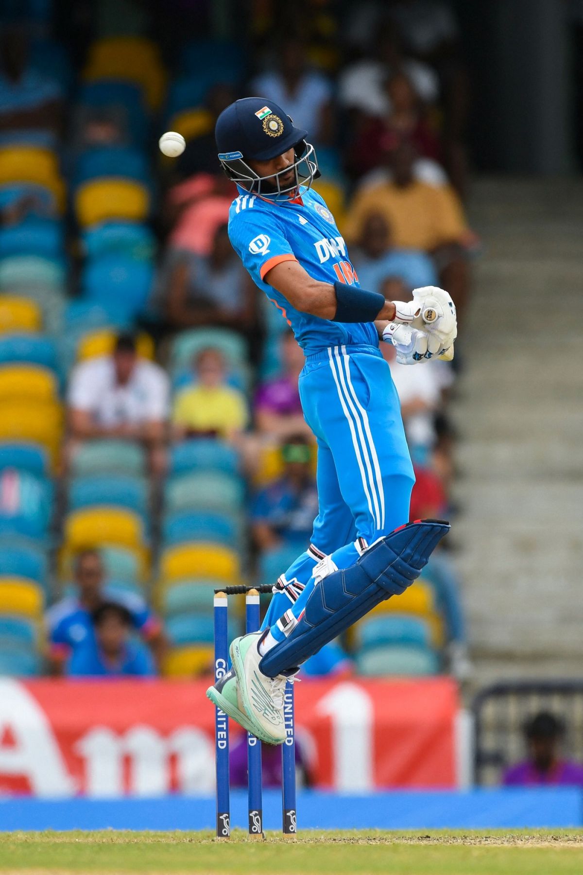 Romario Shepherd celebrates after bouncing Axar Patel out 