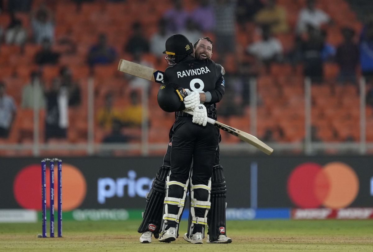Rachin Ravindra embraces his Wellington team-mate Devon Conway for a century, England vs New Zealand, Men's ODI World Cup 2023, Ahmedabad, October 5, 2023