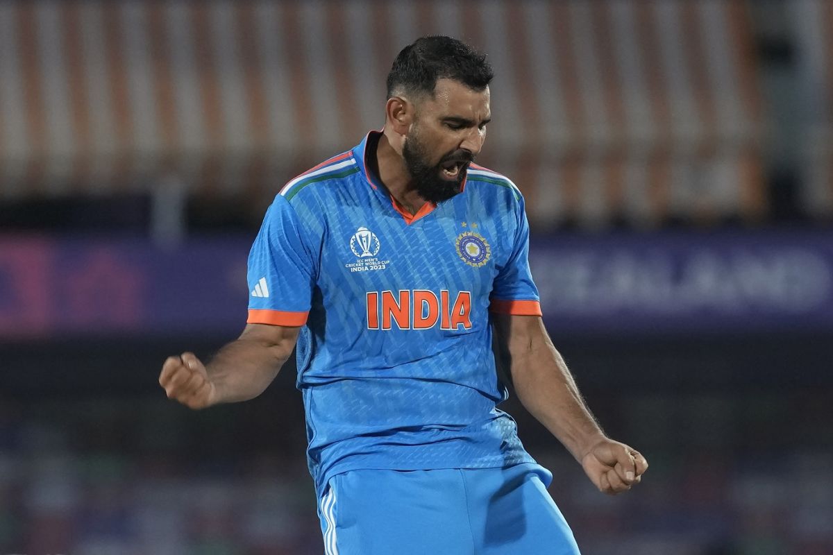 Mohammed Shami is pumped after knocking Mitchell Santner over with a yorker, India vs New Zealand, Men's ODI World Cup, Dharamsala, October 22, 2023