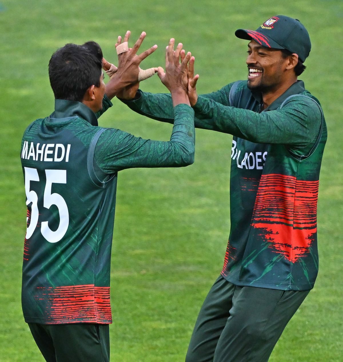 A thrilled Najmul Hossain Shanto celebrates with Mahedi Hasan, New Zealand vs Bangladesh, 1st T20I, Napier, December 27, 2023