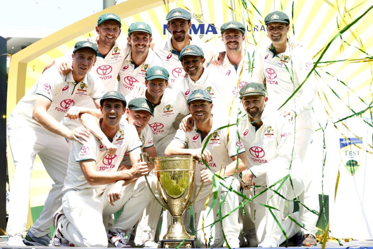 Australia celebrate with the BenaudQadir trophy