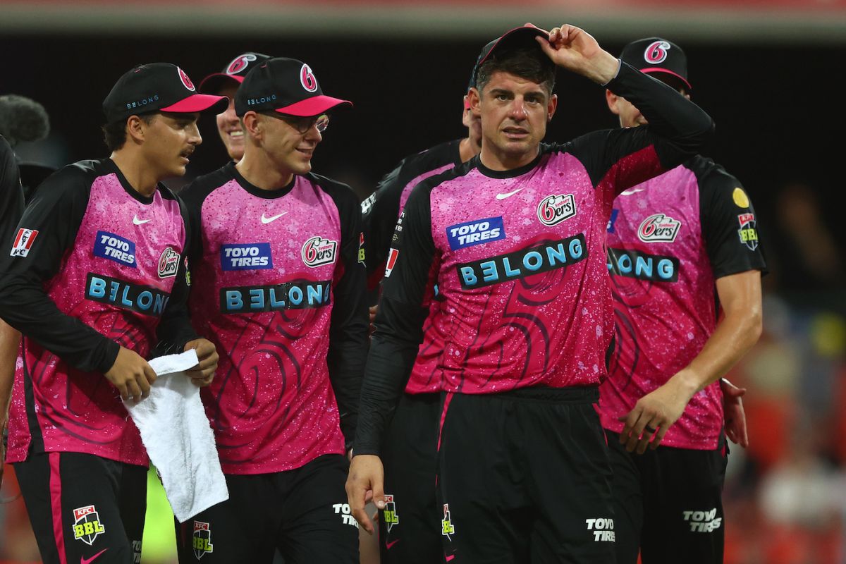 Moises Henriques leads Sixers off the field after securing their place