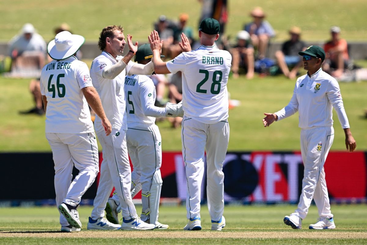 Ryan de Swardt is congratulated by team-mates after he removed Tom ...