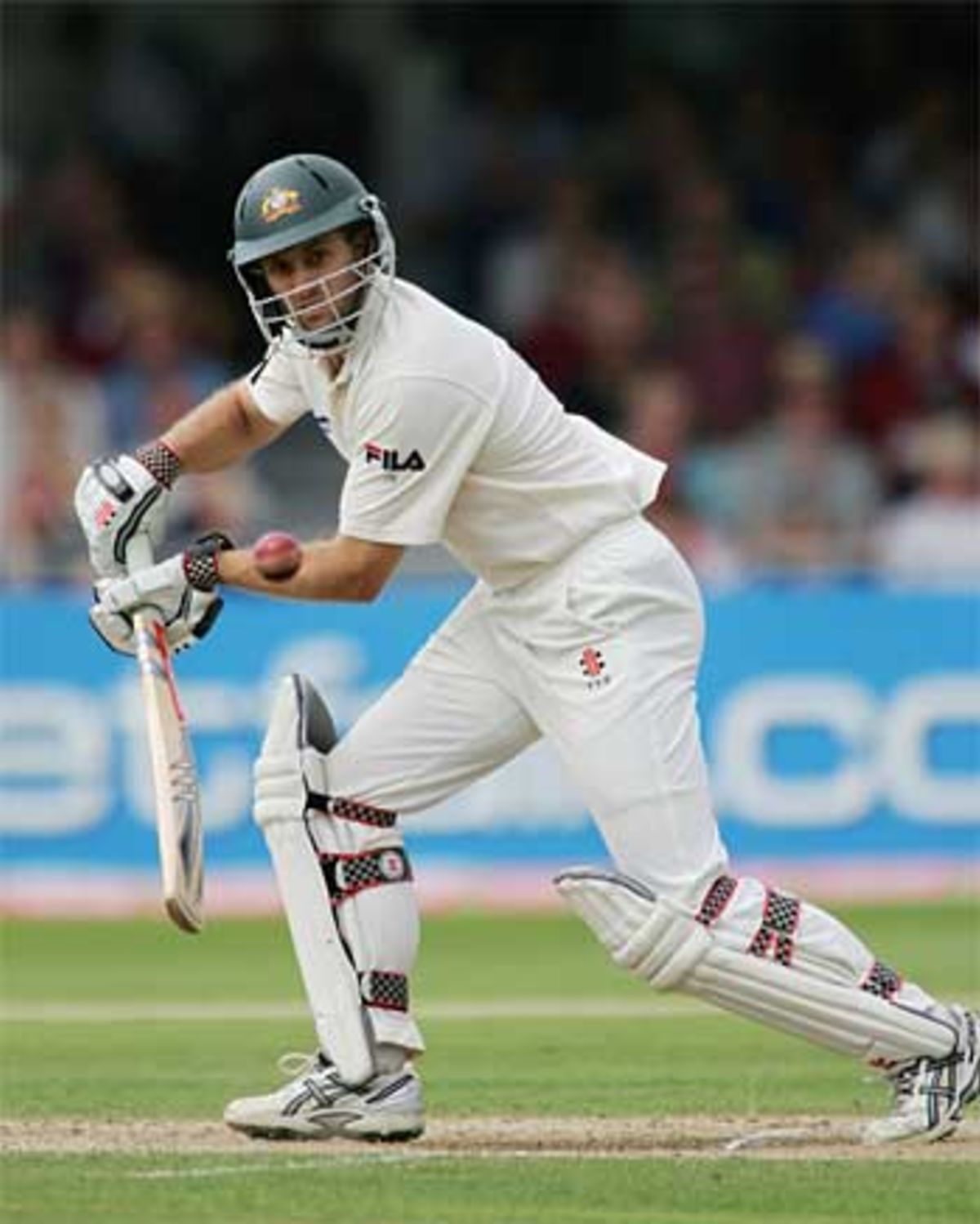 Simon Katich pushes through point