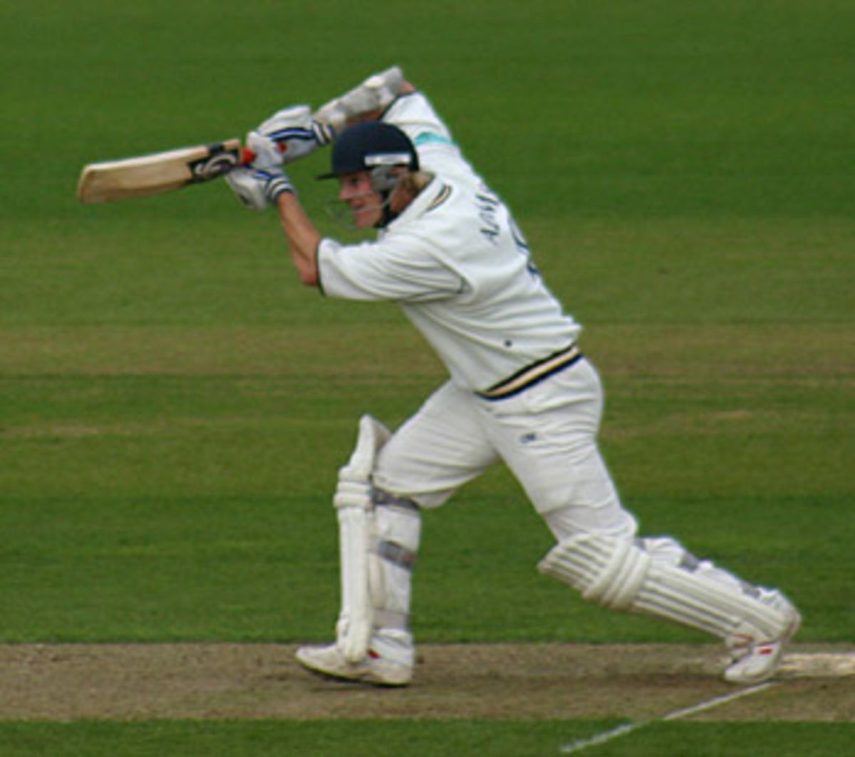 James Adams drives on his way to 50