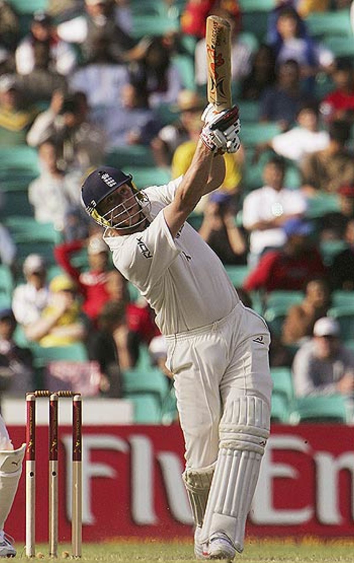 Brett Lee takes a good catch to end Andrew Flintoff's innings of 35 ...