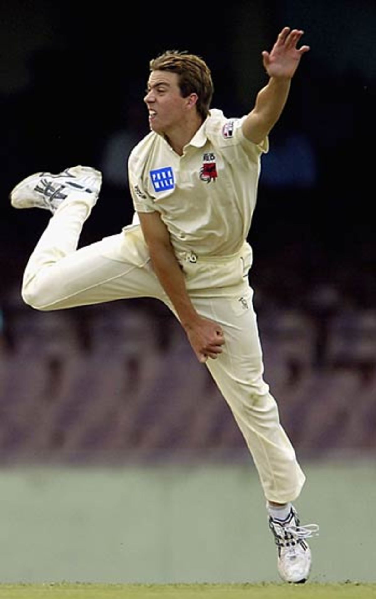 Simon Katich of NSW celebrates his century with team mate Michael Clarke