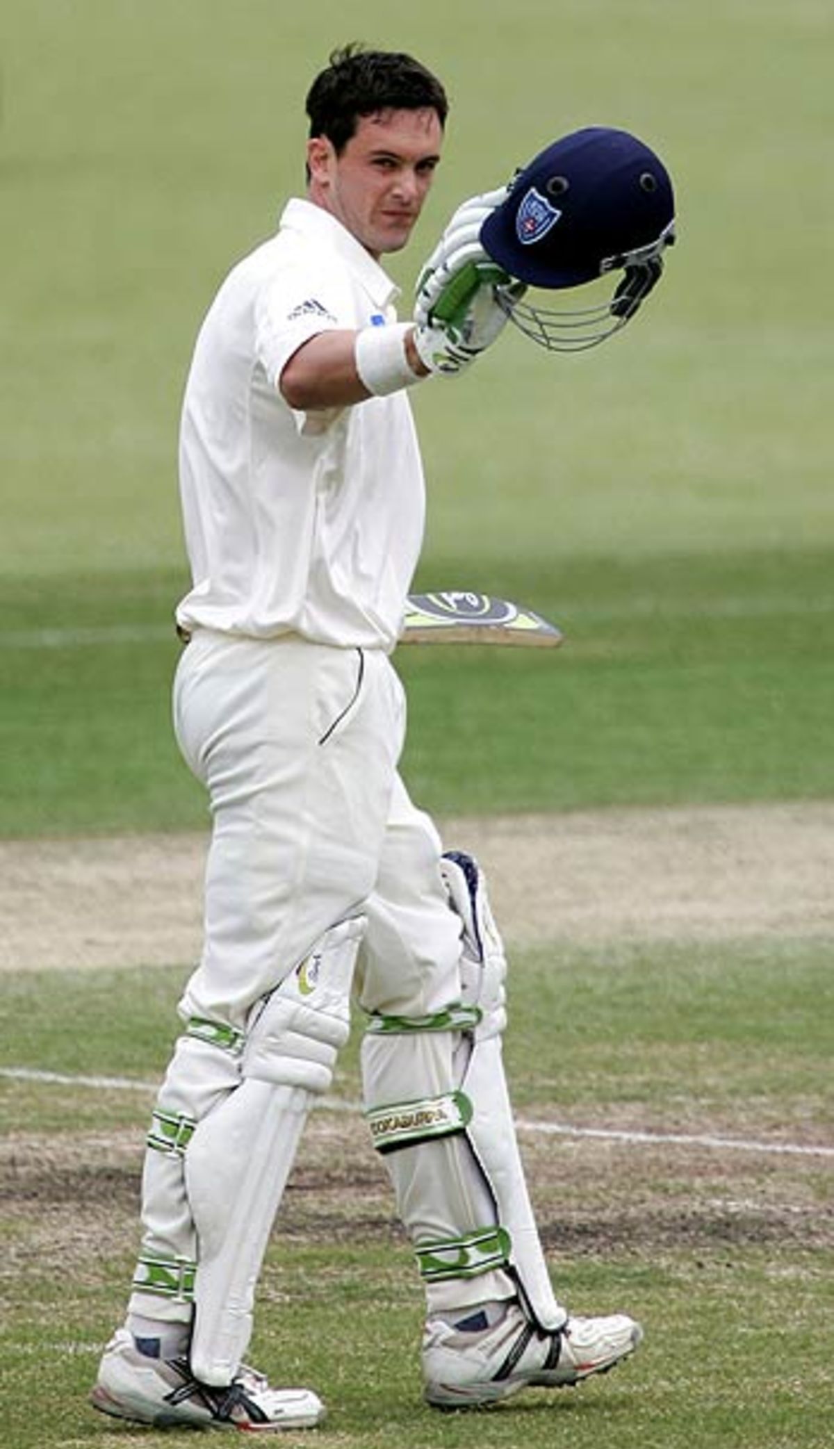 Aaron O'Brien acknowledges the crowd after his hundred against Western Australia