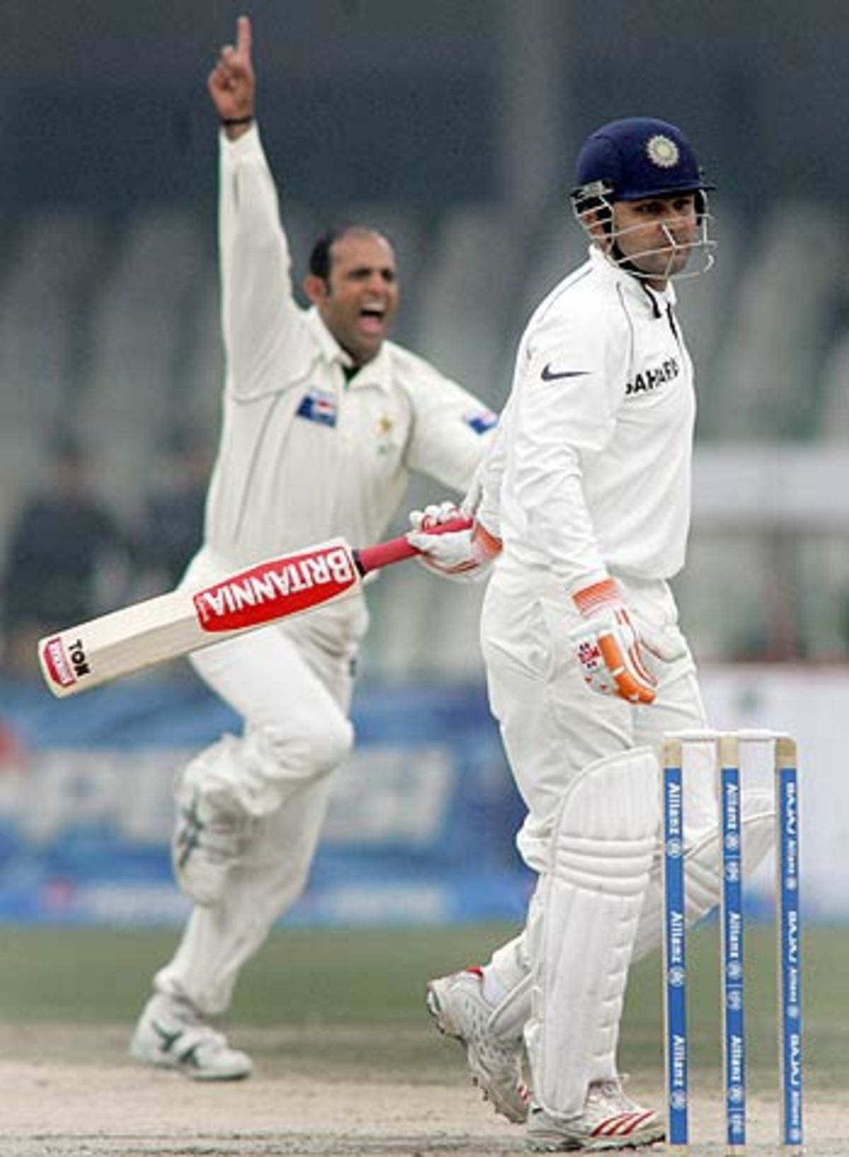 Naved-ul-Hasan dismissed Virender Sehwag just 4 runs short of a world record partnership, India in Pakistan, 1st Test, Lahore, January 17, 2006
