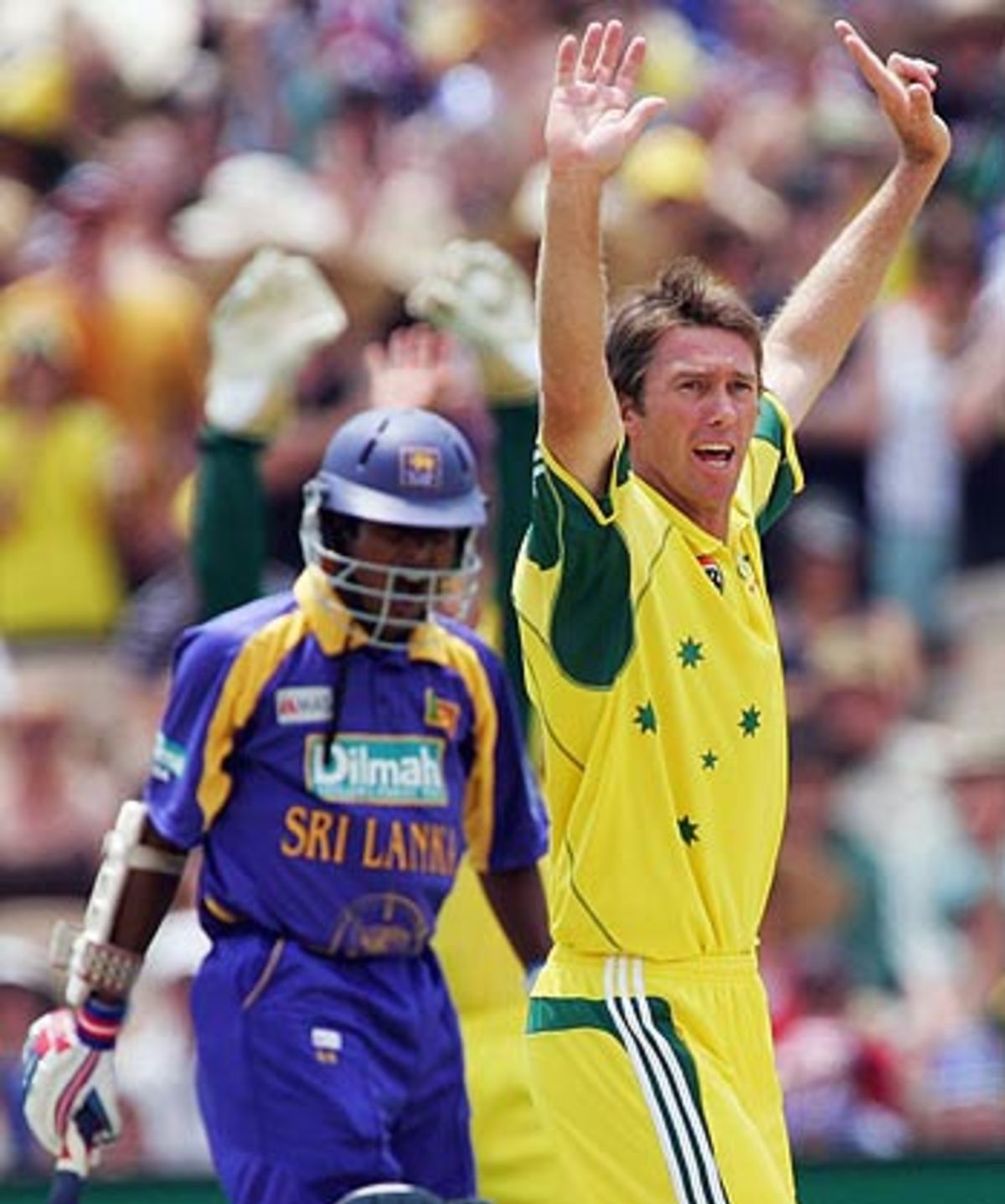 a-fan-waves-the-australian-flag-ahead-of-game-seven-espncricinfo