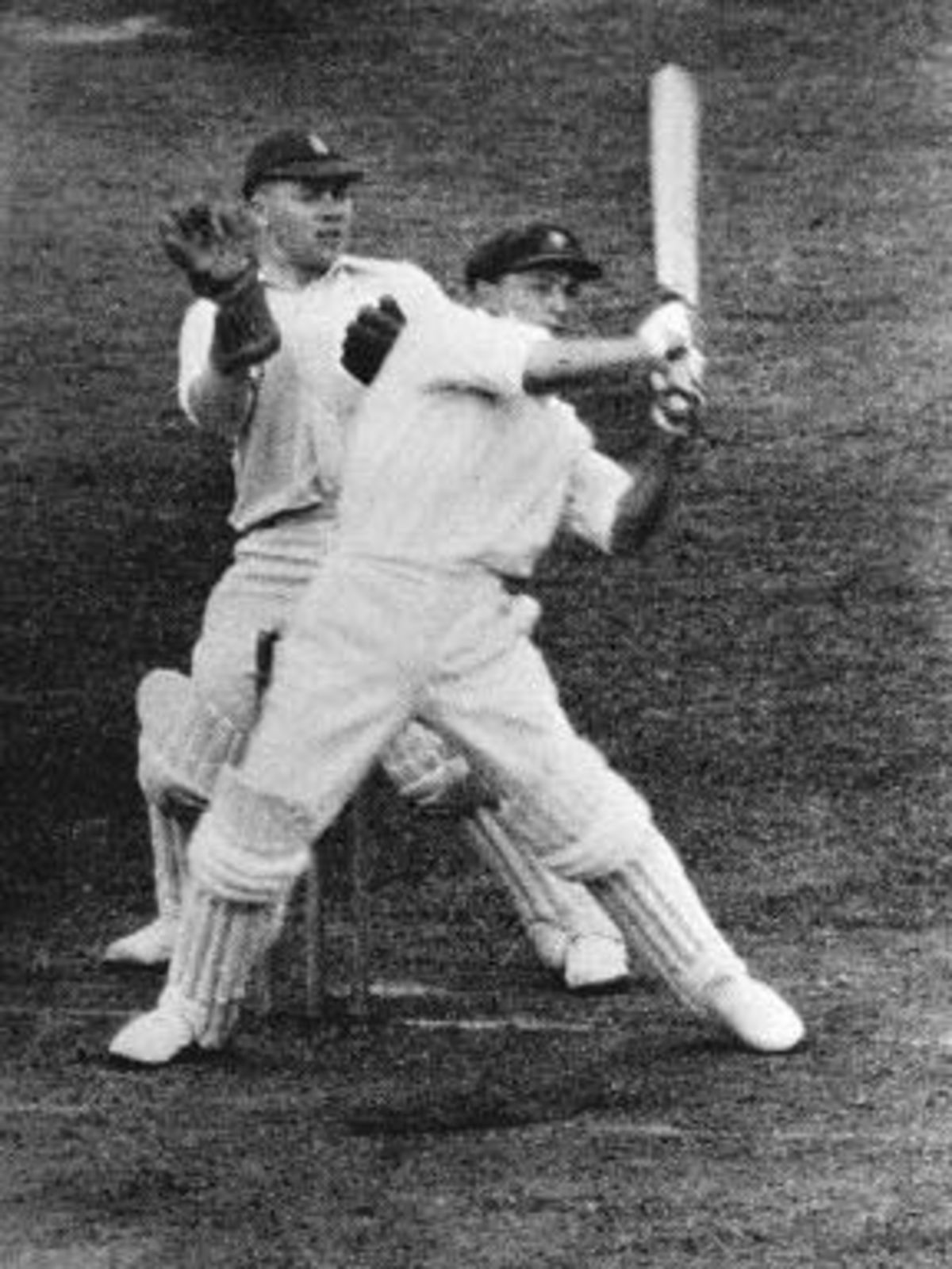 Don Bradman walks through the crowd after scoring a triple century