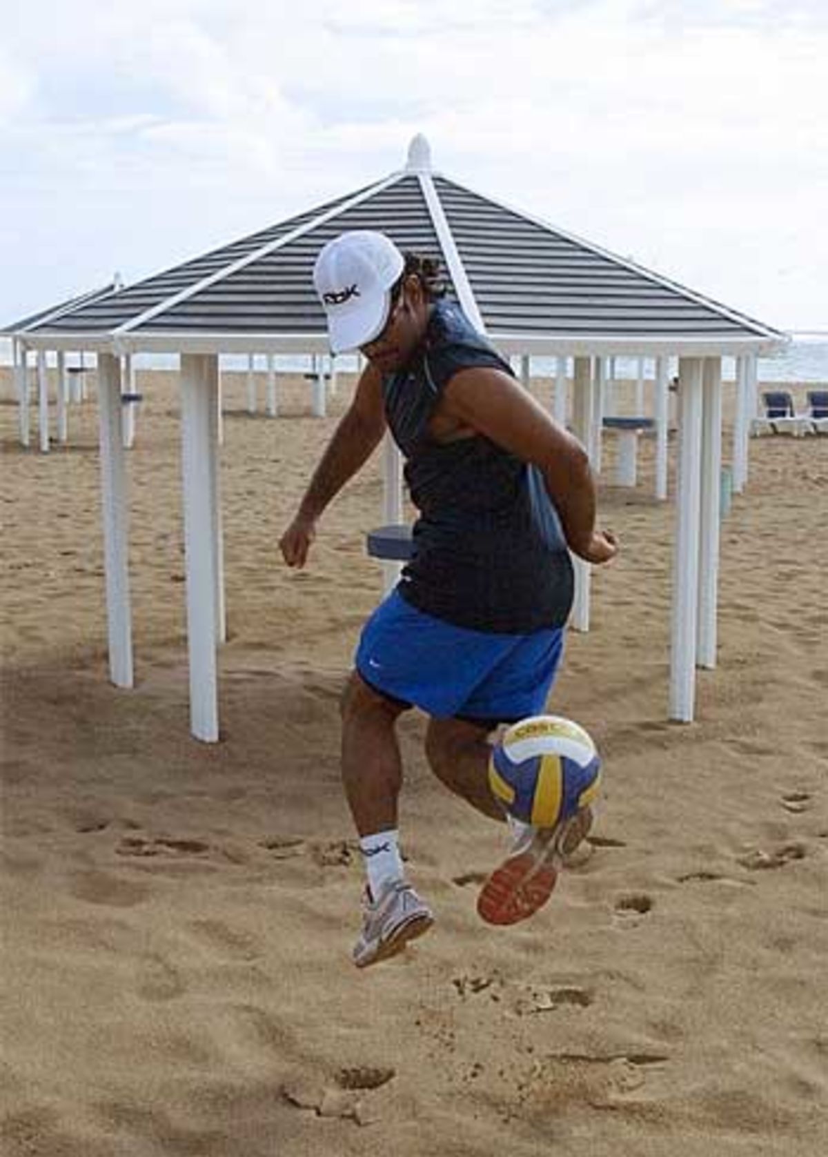 The talented Mr Dhoni the cricketer plays football with a volleyball