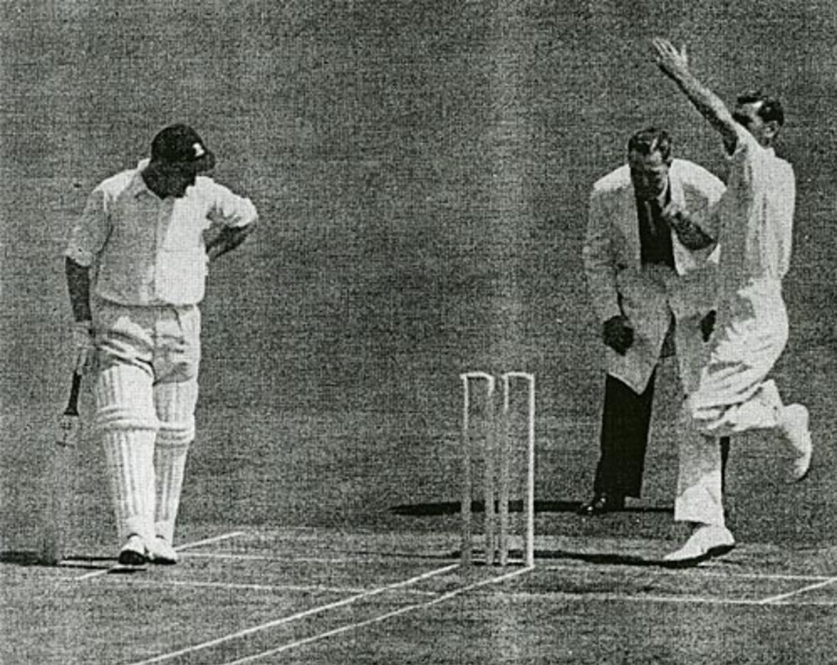 Derek Shackleton bowls, Ken Barrington watches during an experimental match at Lord's.  Four stumps and gridlines on the pitch were tried, July 11, 1963