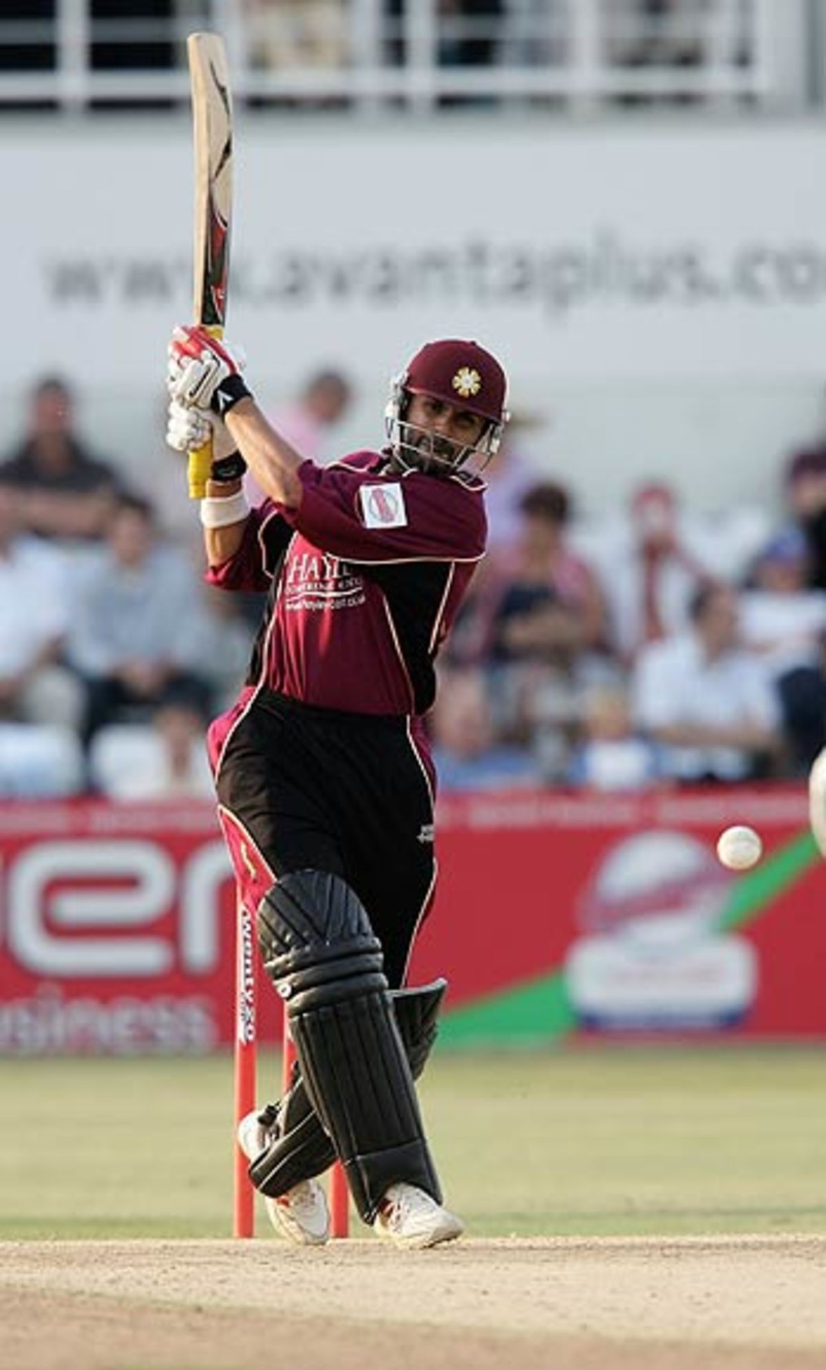 Usman Afzaal hits one past the bowler during his unbeaten 64