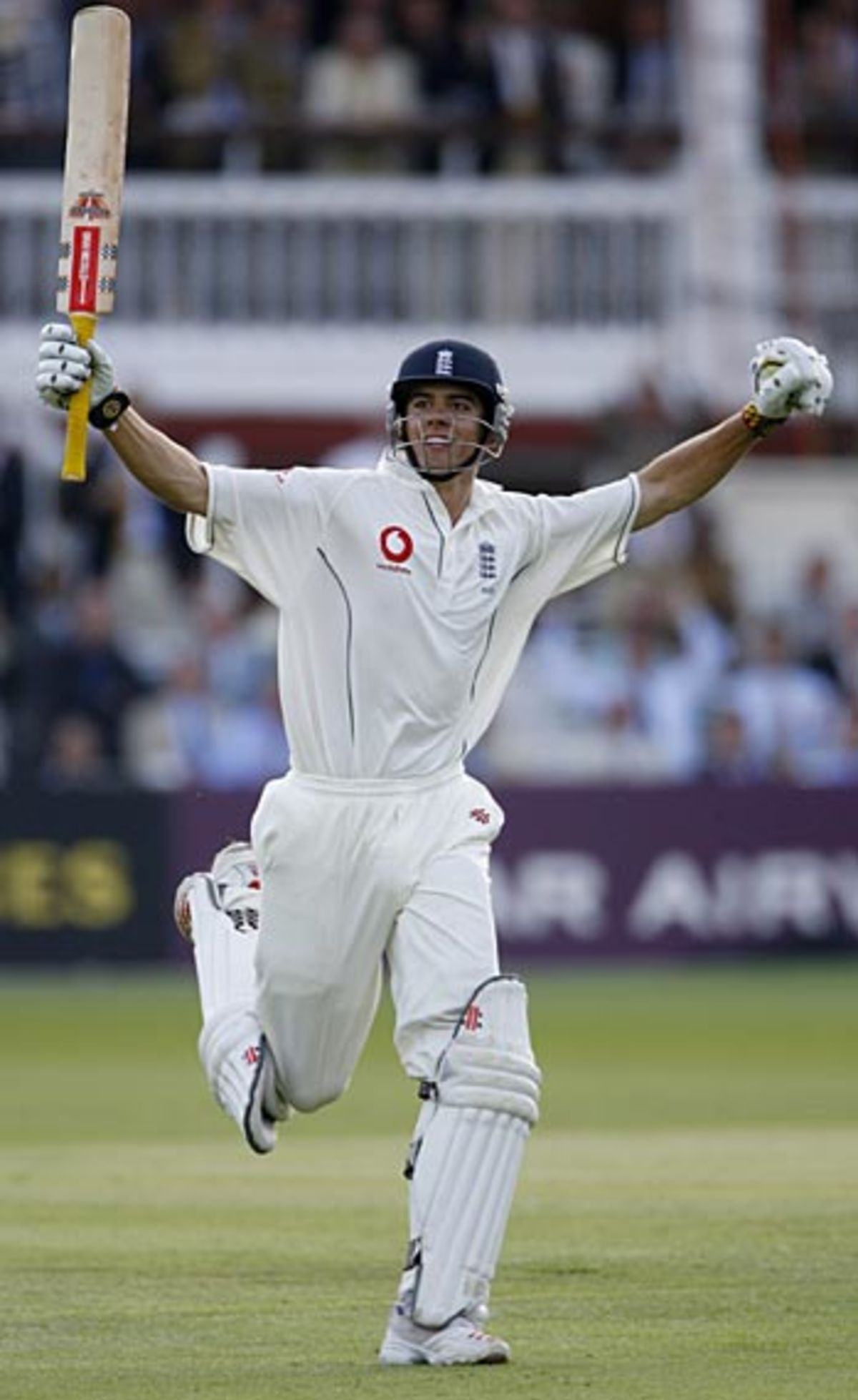 Arms aloft, Alastair Cook celebrates his second hundred