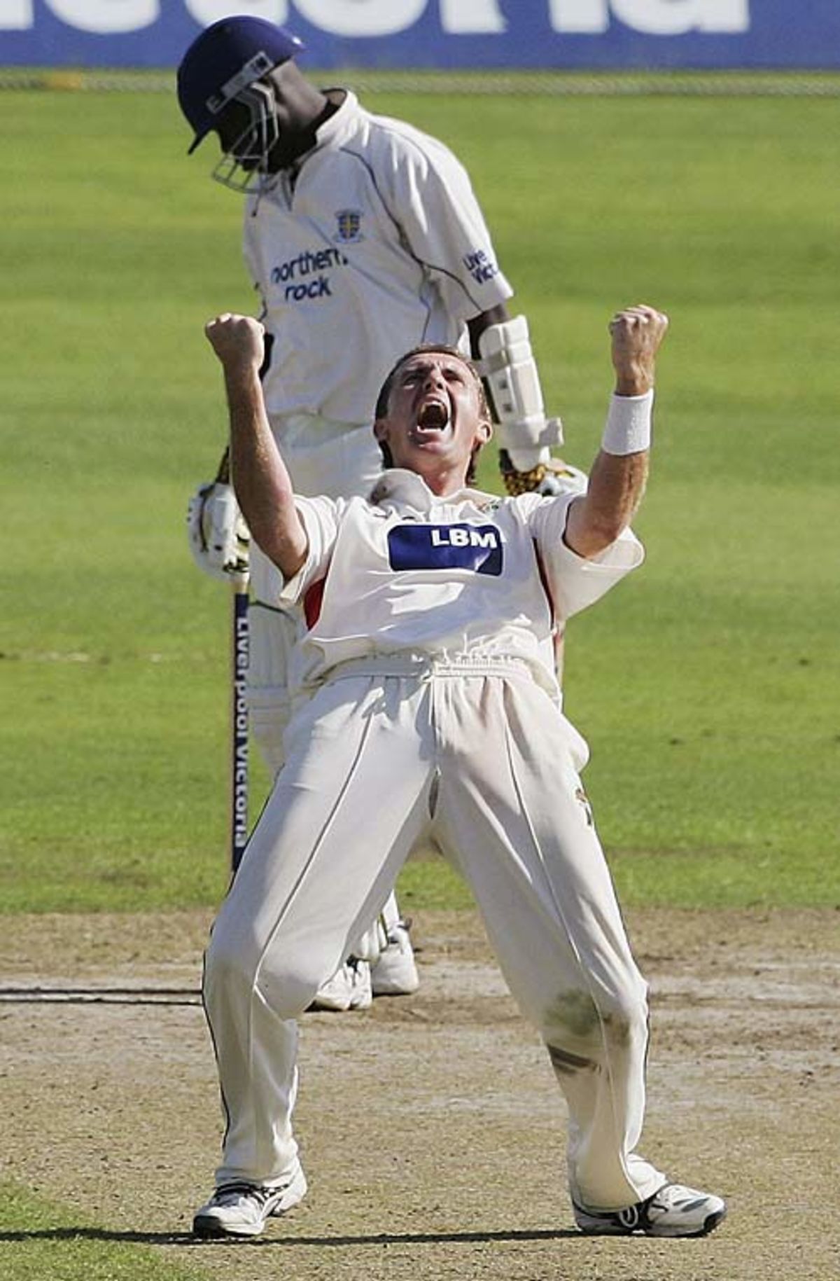 The diffident Dominic Cork celebrates Ottis Gibson's wicket