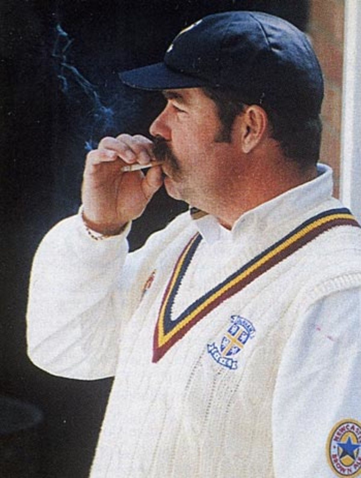 David Boon takes a cigarette break