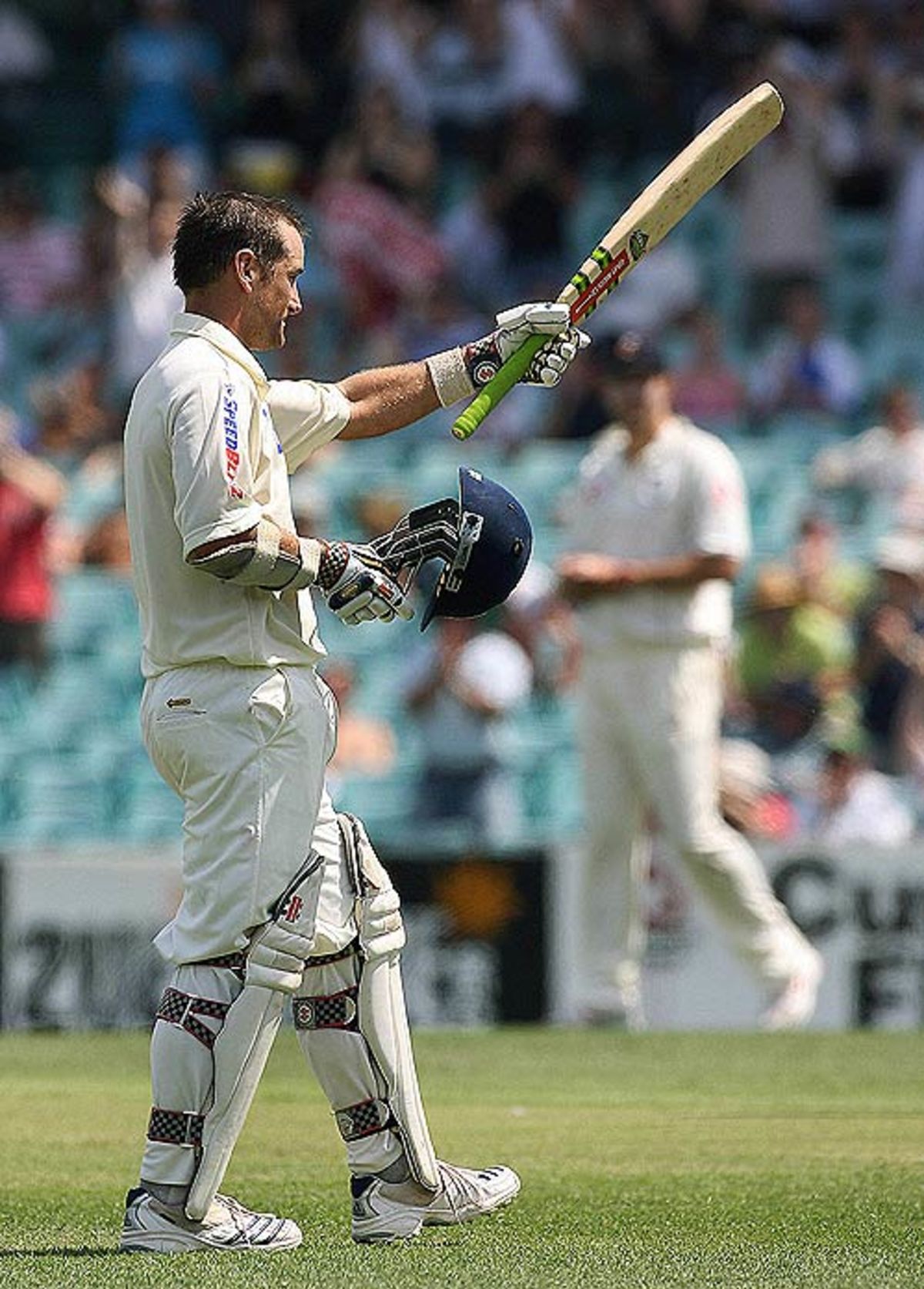 Phil Jaques acknowledges the crowd after reaching his century against ...