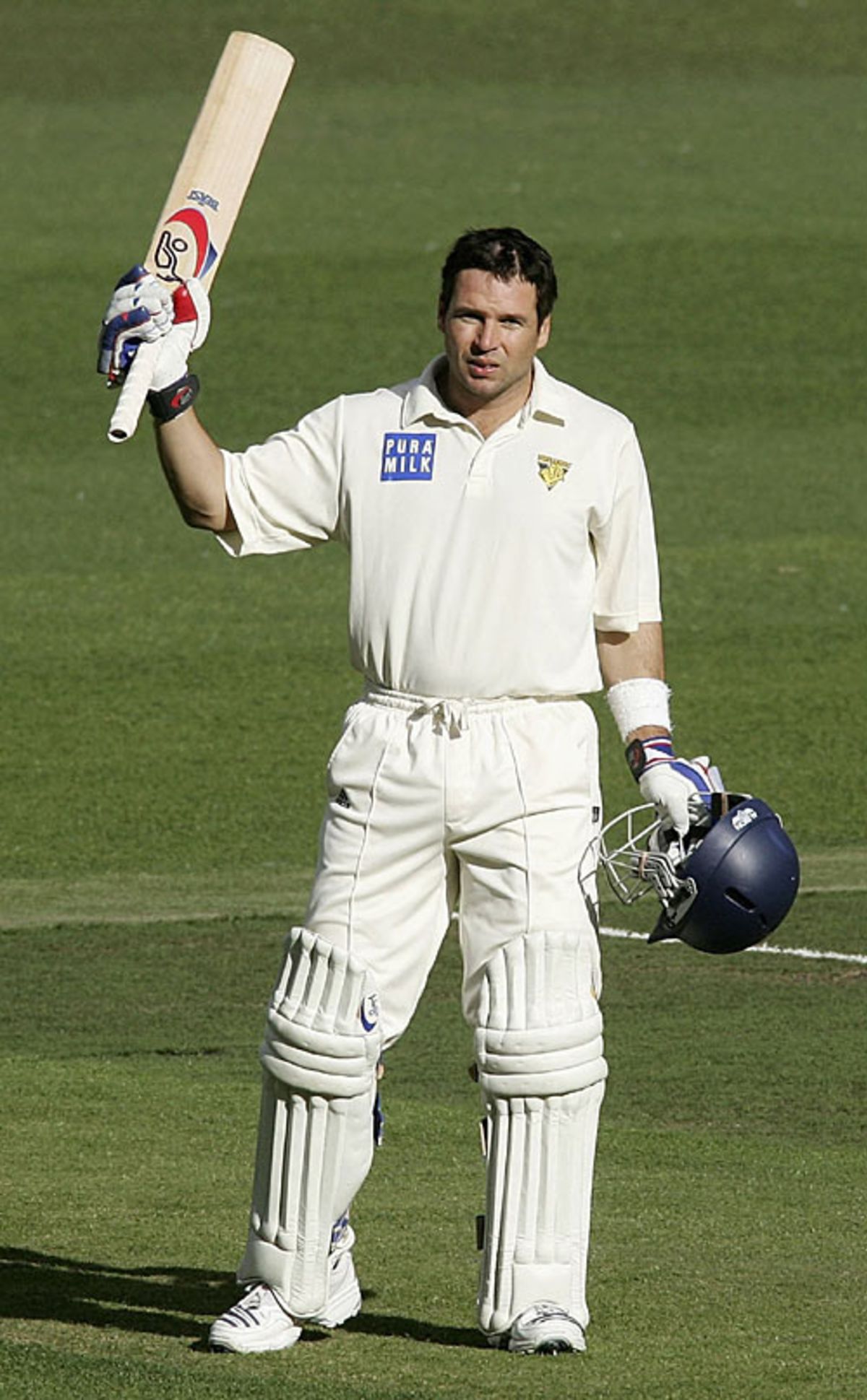 Brad Hodge celebrates his 150