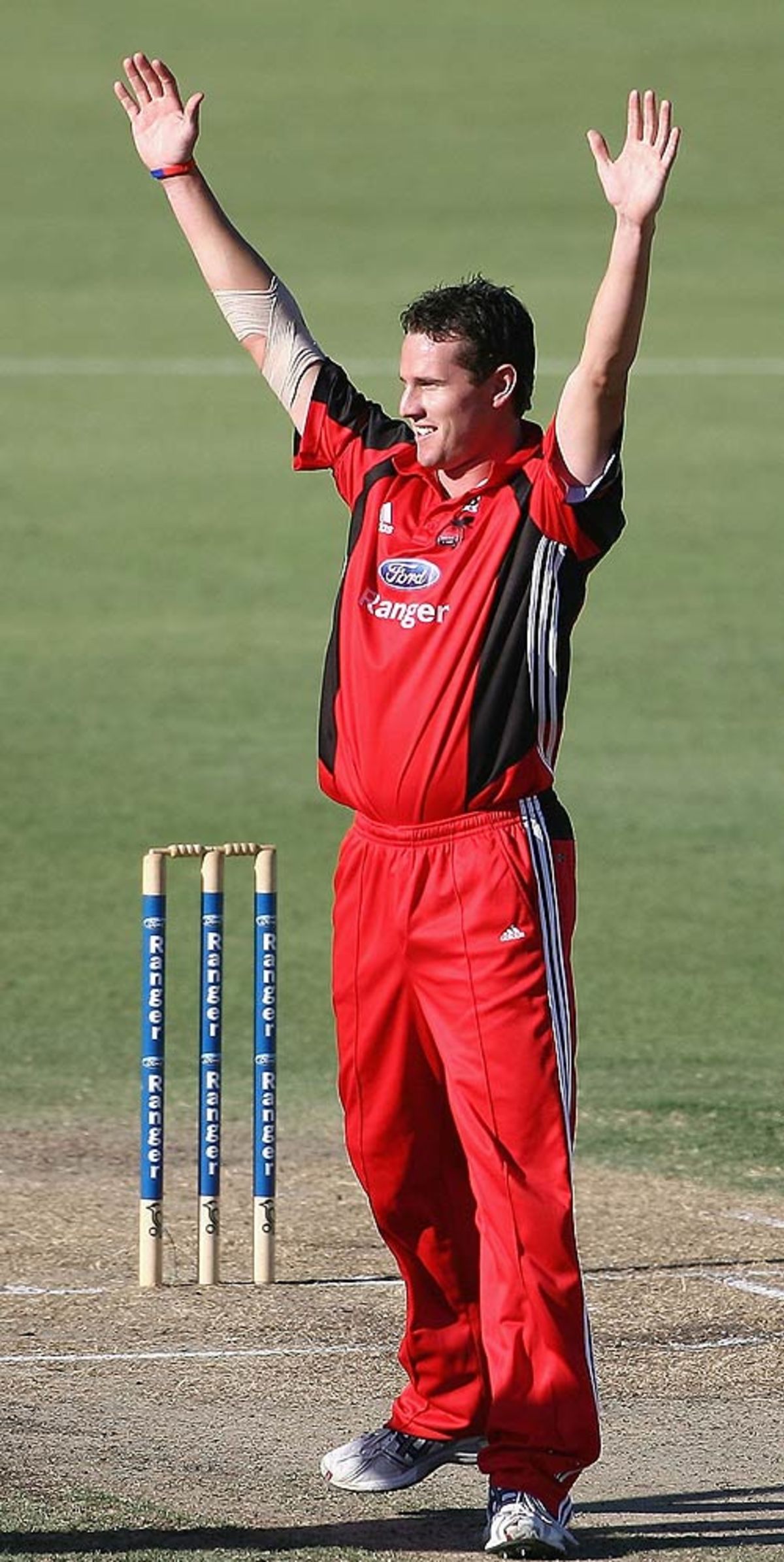 Shaun Tait celebrates one of his four wickets | ESPNcricinfo.com