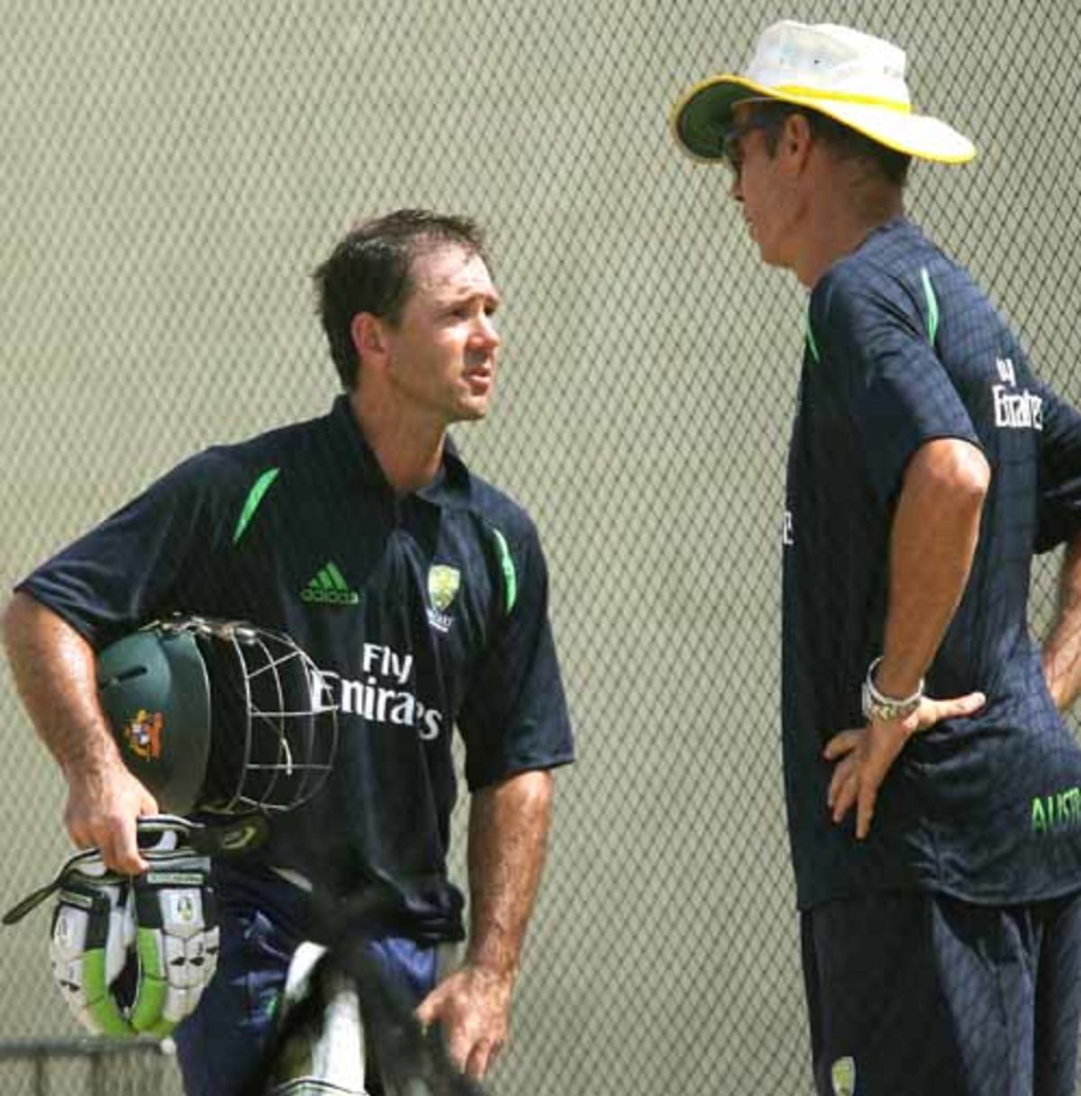 Ricky Ponting converses with John Buchanan during a net session