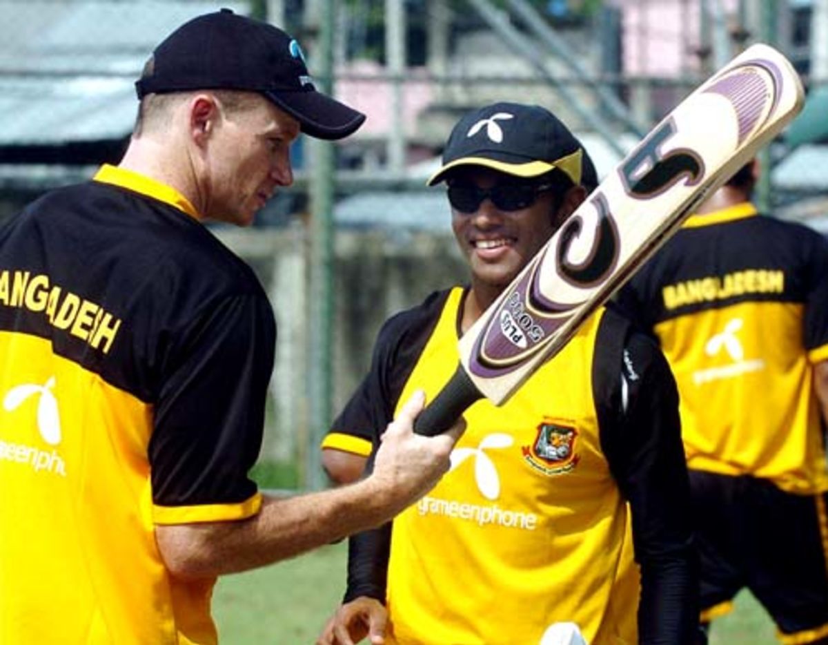 Mehrab Hossain jnr in consultation with coach Shaun Williams ...