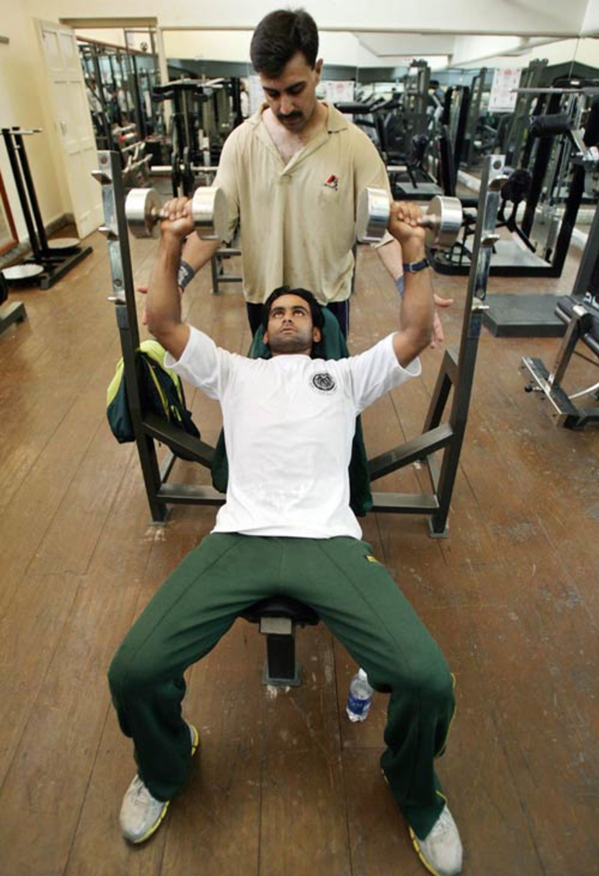 Mohammad Hafeez works out at a gym during a training camp in Abbottabad, Pakistan, June 21, 2007