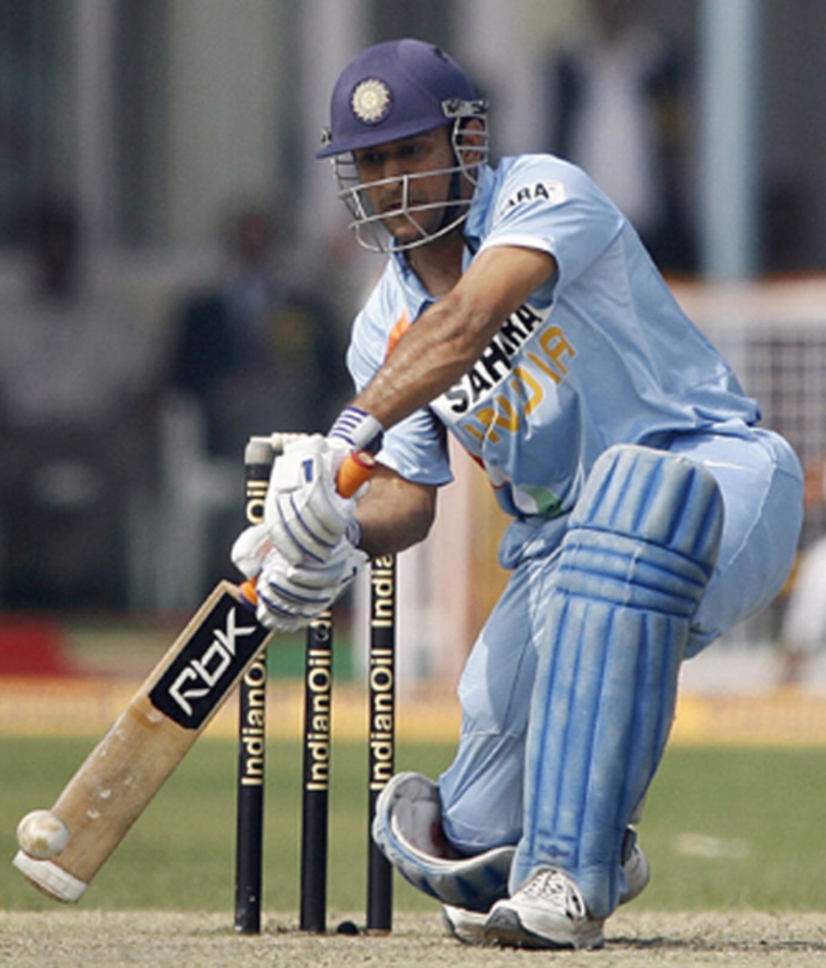 Mahendra Singh Dhoni drives during his 49 | ESPNcricinfo.com