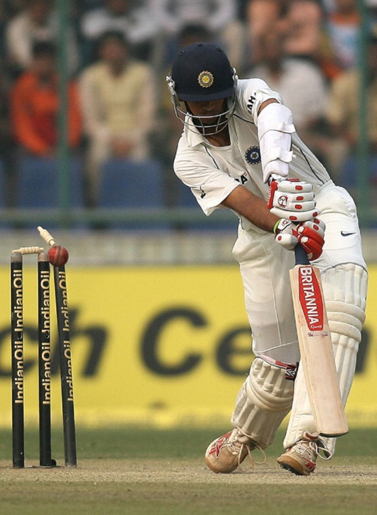 Rahul Dravid's leg stump is pegged back by a delivery from Shoaib ...