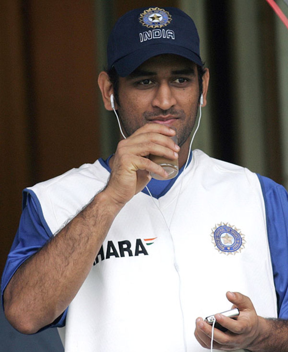 Mahendra Singh Dhoni takes time out during practice