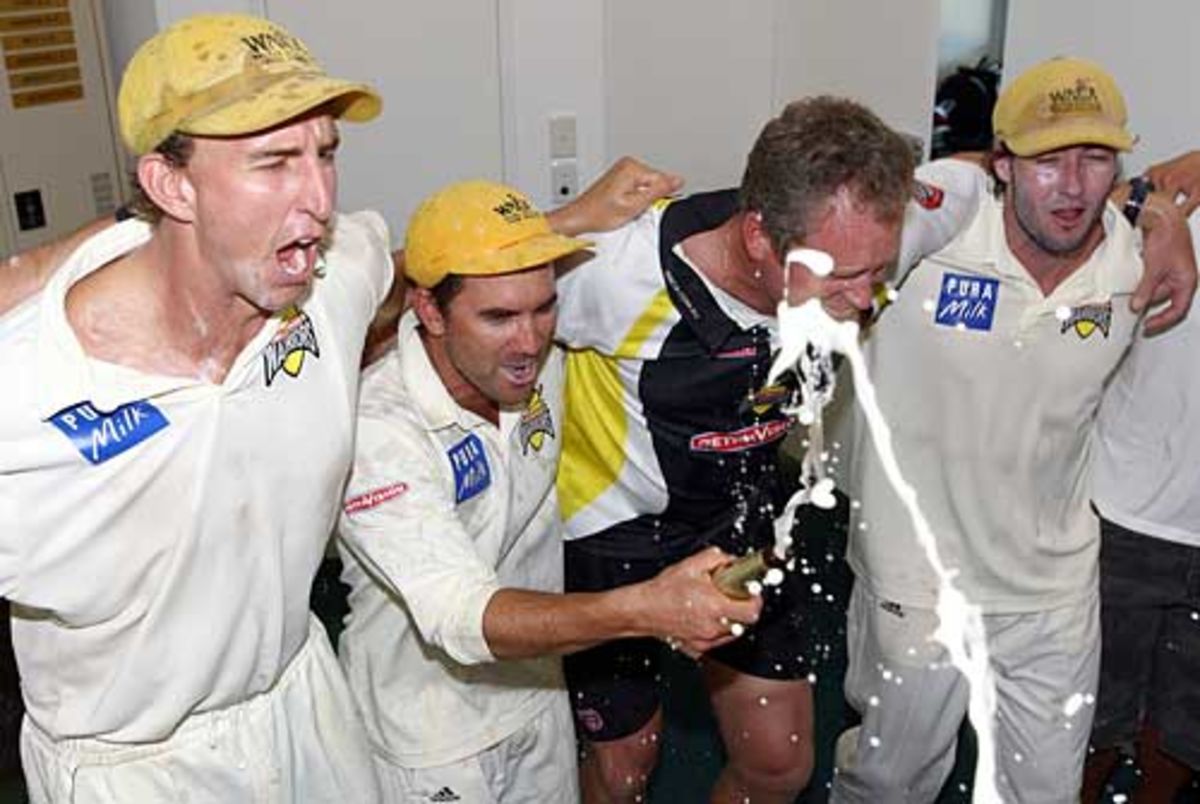 Justin Langer with his daughter Grace