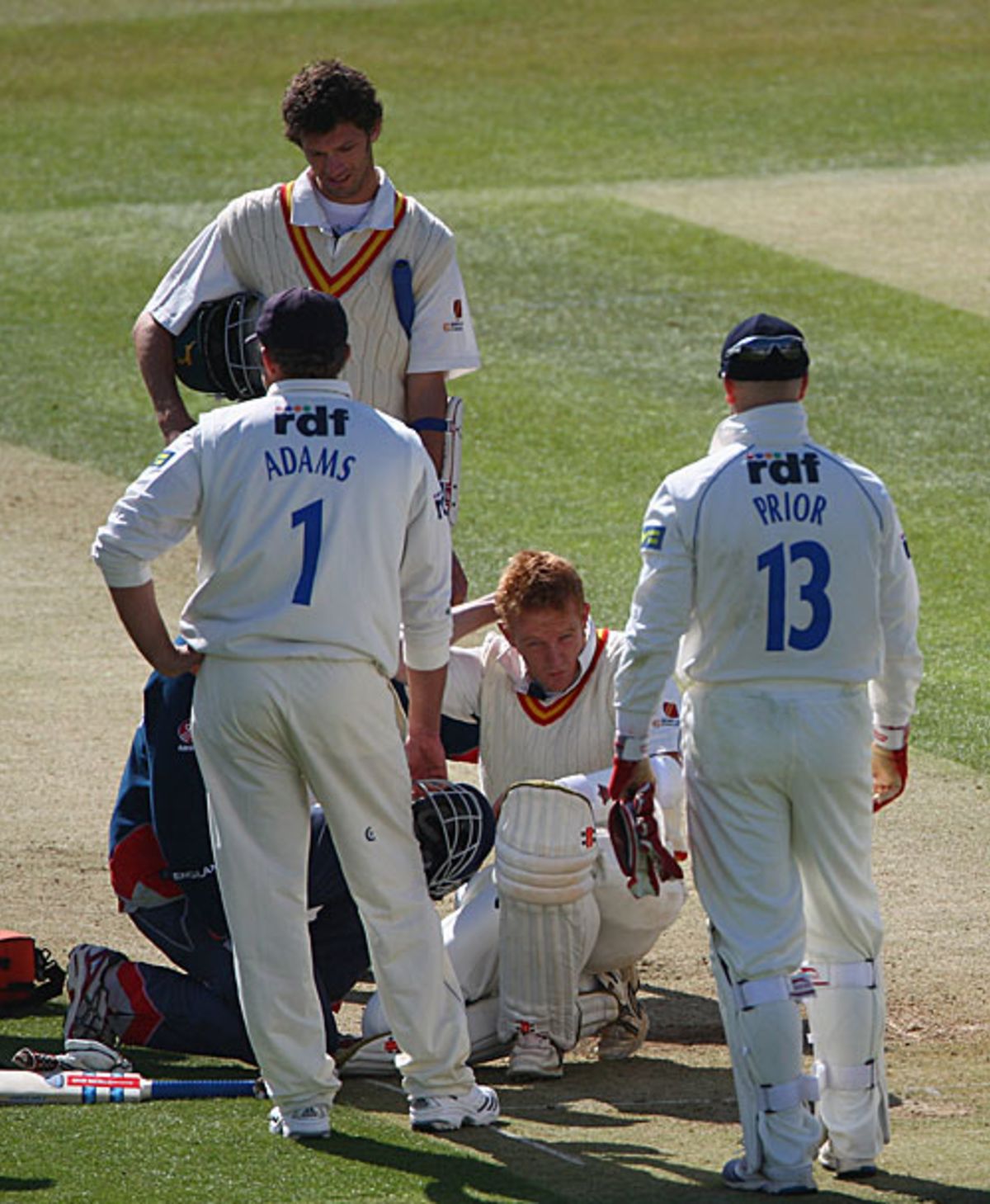 Concerned Players Hover Over Steve Kirby After He Was Smacked On The 