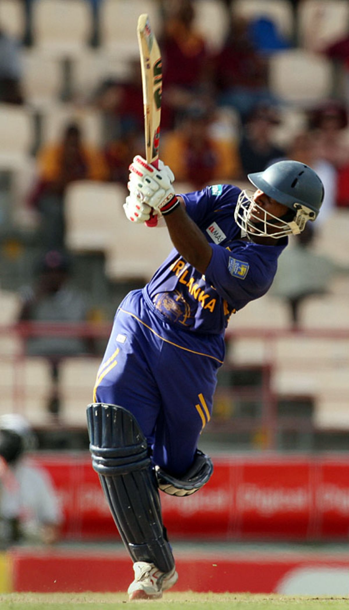 Mahela Udawatte deposits a six into the crowd at midwicket