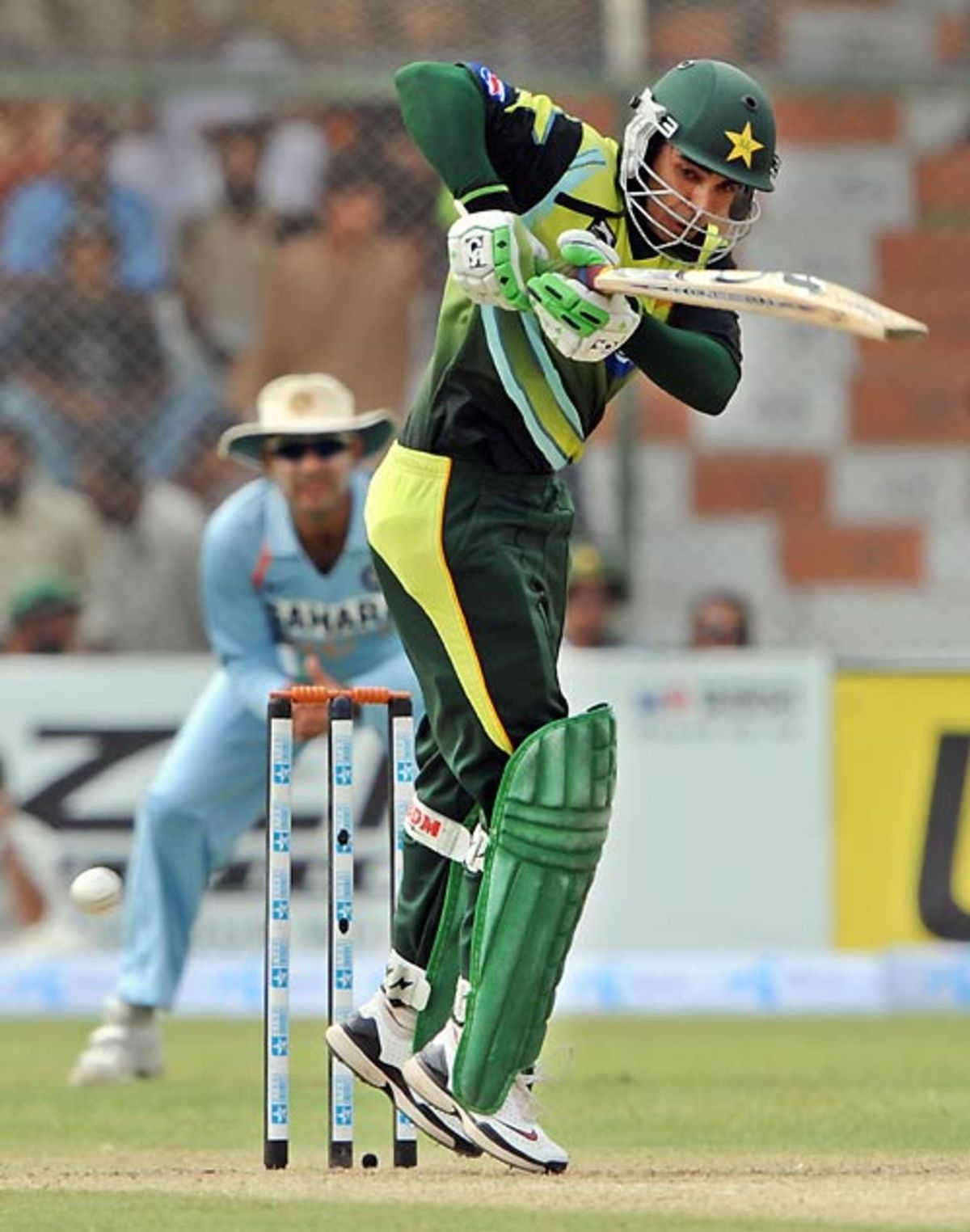 Shoaib Malik attempts a cheeky dab past the wicketkeeper | ESPNcricinfo.com