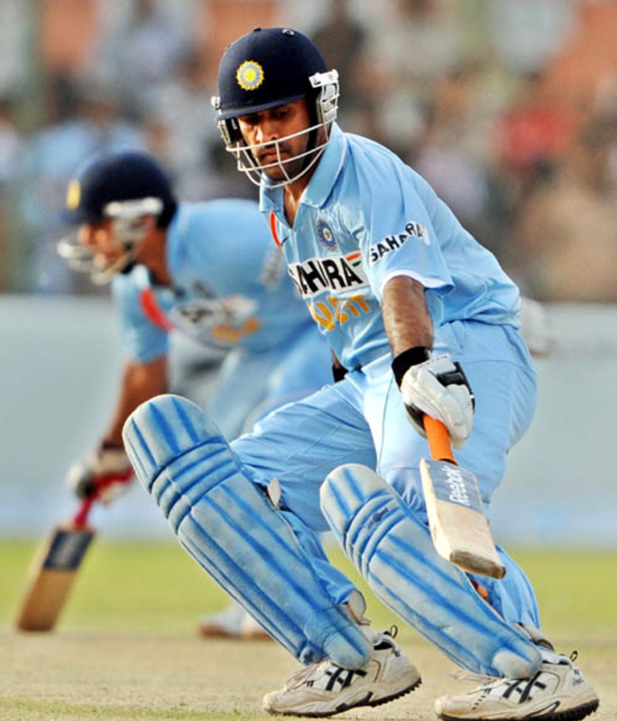 Mahendra Singh Dhoni steers the ball through the off side ...